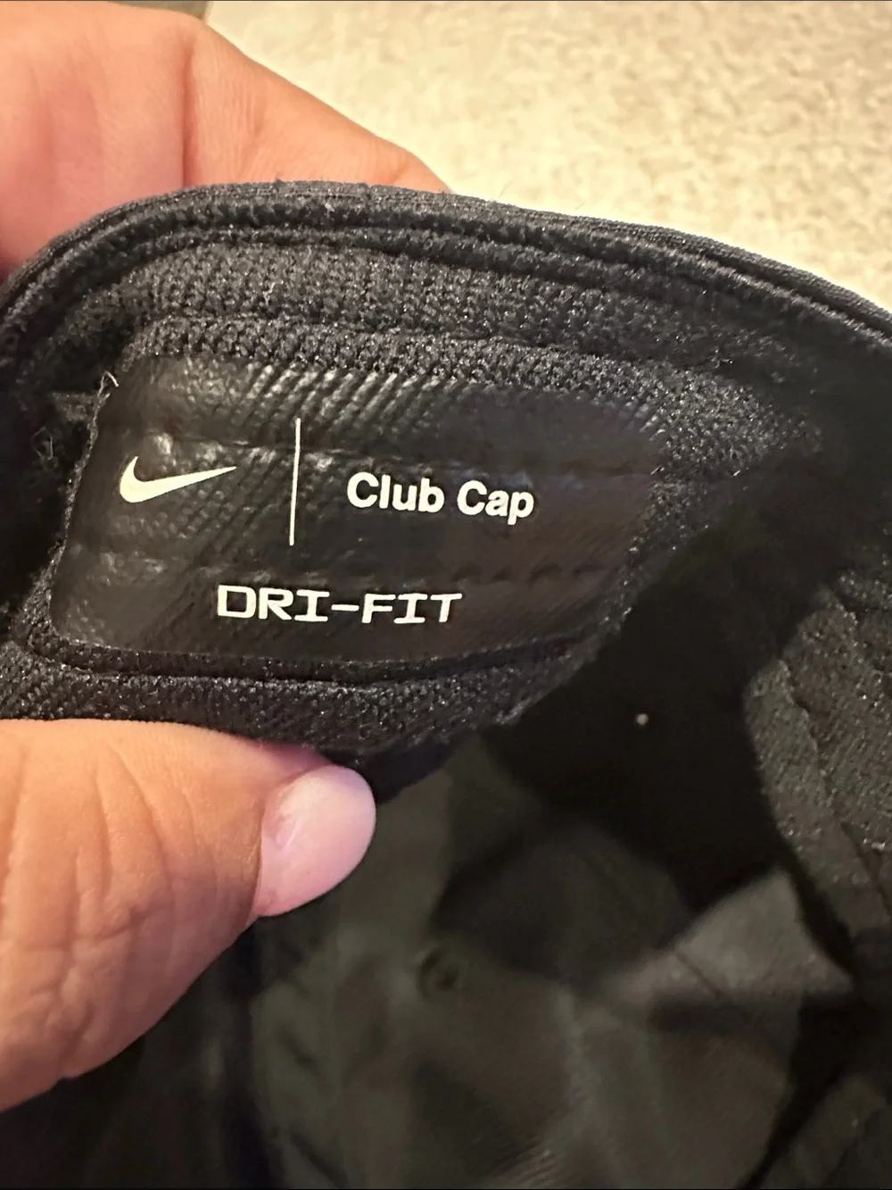 Nike Black Cap with White Swoosh Logo